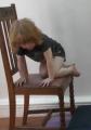 2y 11m climbing onto chair 2_0.jpg