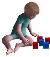 Toddler sitting reaching across midline